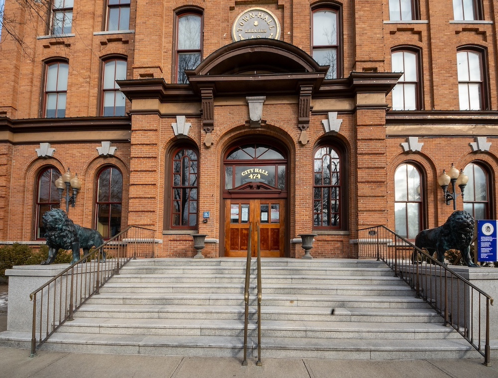 Saratoga Springs, Ny Usa Mar. 6, 2021: A Closeup View Of The Entrance To The Saratoga Springs City Hall, An Ornate Three Story Brick Italianate Building Built In 1871 By Cummings And Burt Of Troy.