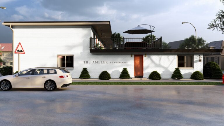 A white brick building labeled 